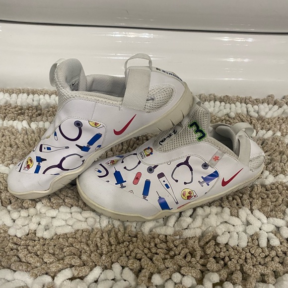 Nike Shoes - Nike White Sneakers with Colorful Graphics